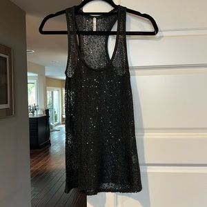 Sheer Holiday top like new. Black see-through knit